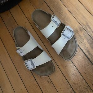 White leather Birkenstock Arizona sandals